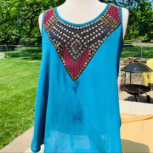 Flowy open back top with bling